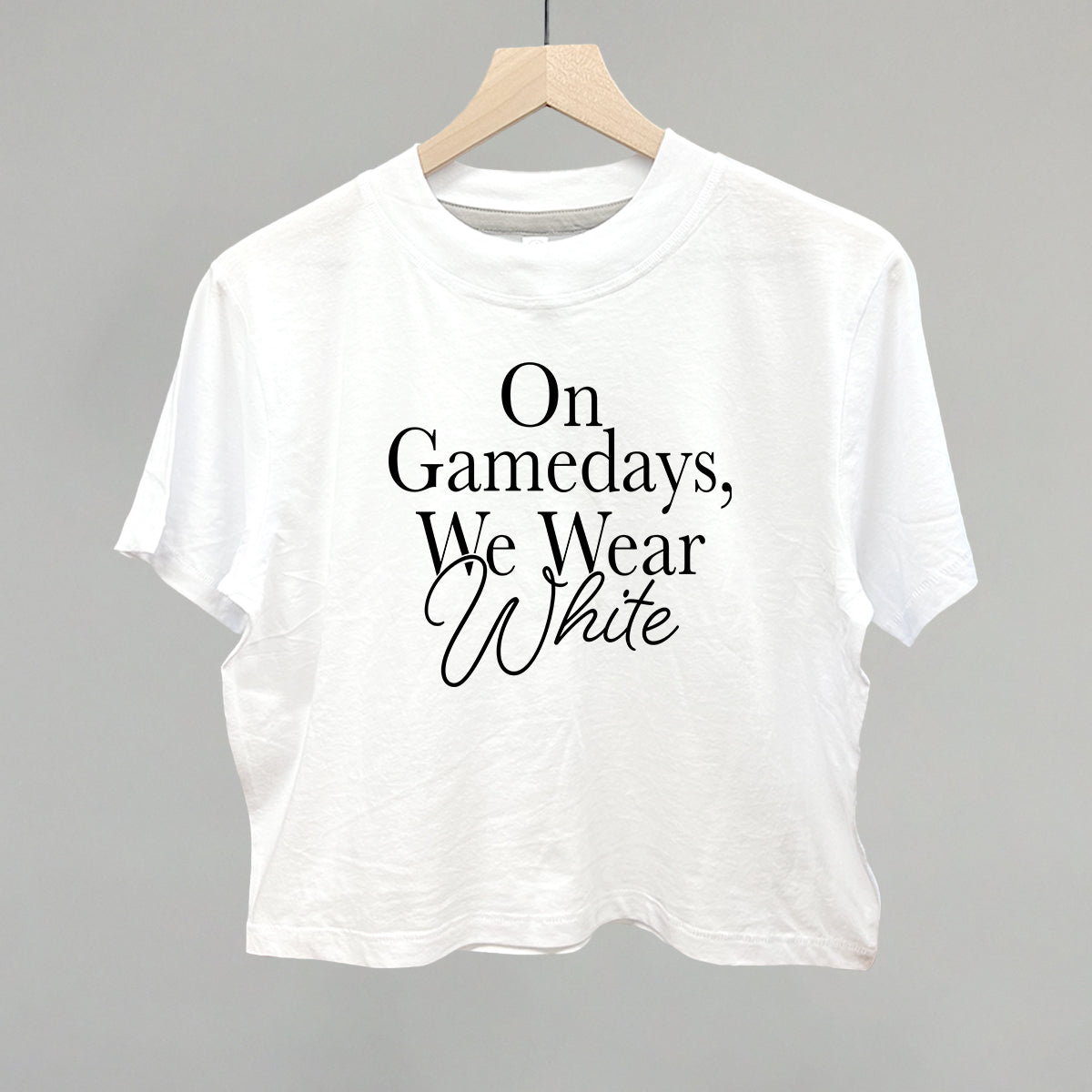 On Game Days, We Wear White boxy tee in white for game day white apparel styling.